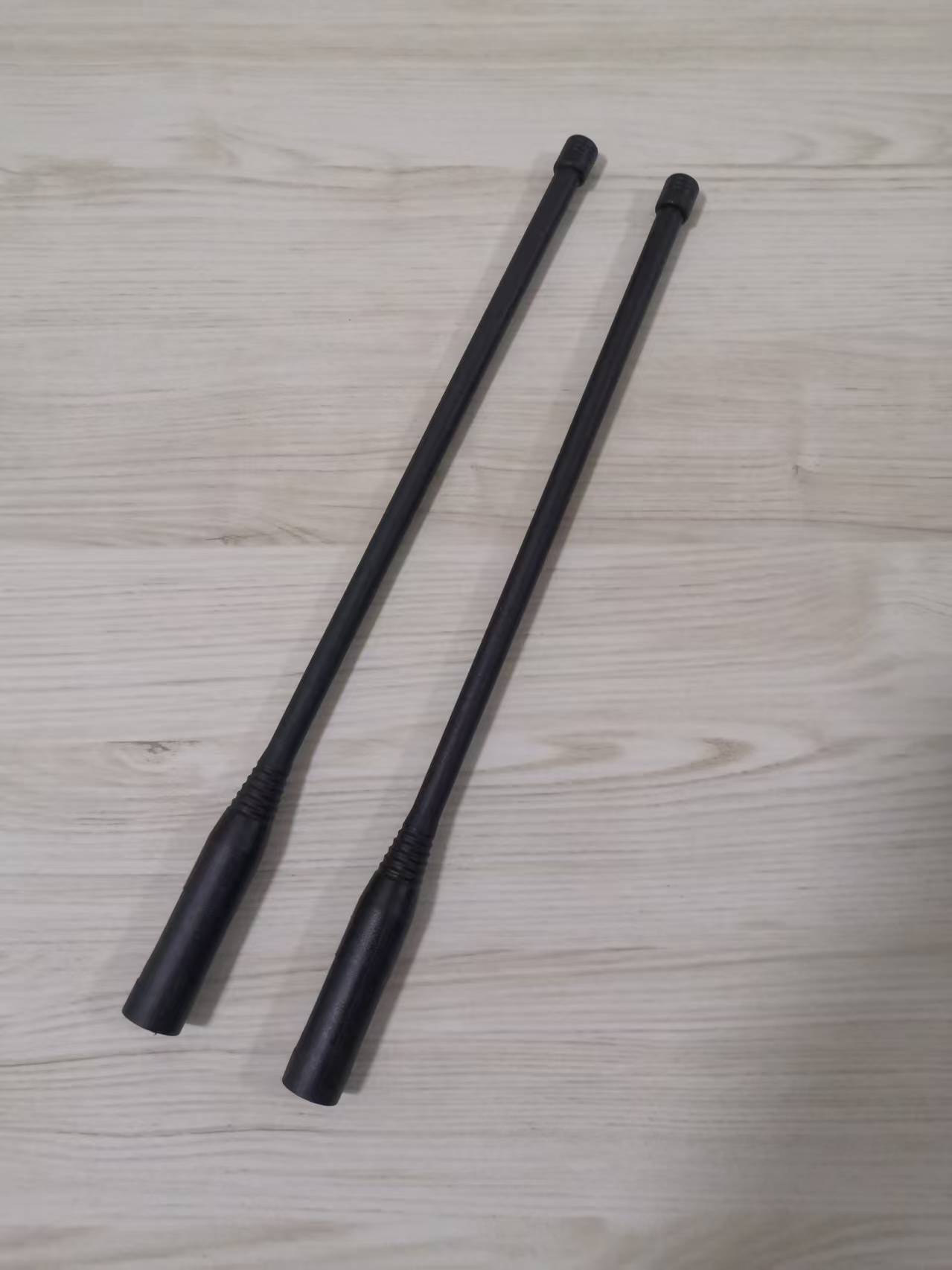 GLGTDB10W black broadband whip antenna in the two documented length options