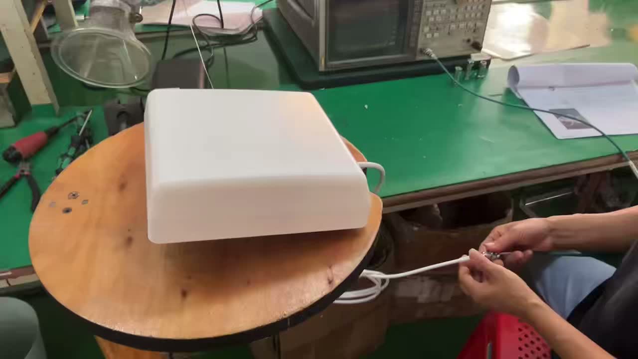 GLW2400V14 white panel antenna sample on the test bench, frame from the supplied test video.